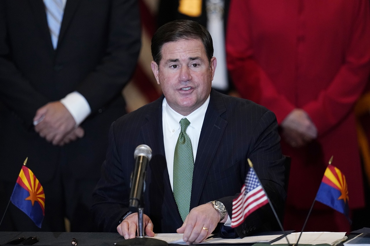 Arizona governor signs a lineup of Covid19 and election reform bills