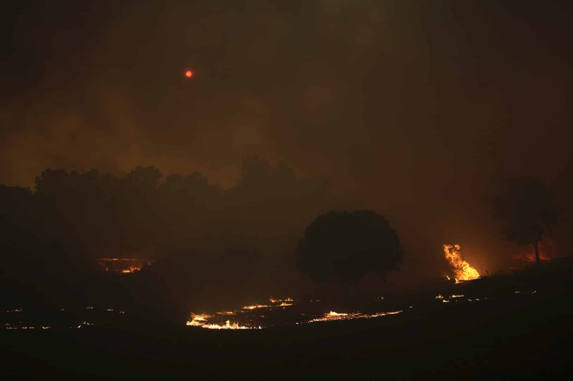 Villages battle wildfires in Portugal; Europe swelters Courthouse