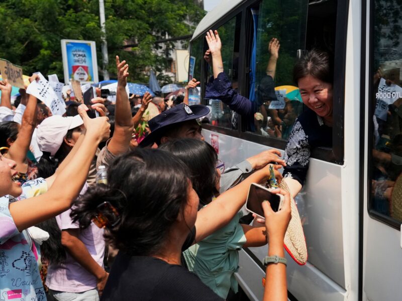 Myanmar ex-president freed from post-coup detention, Suu Kyi's sentence cut