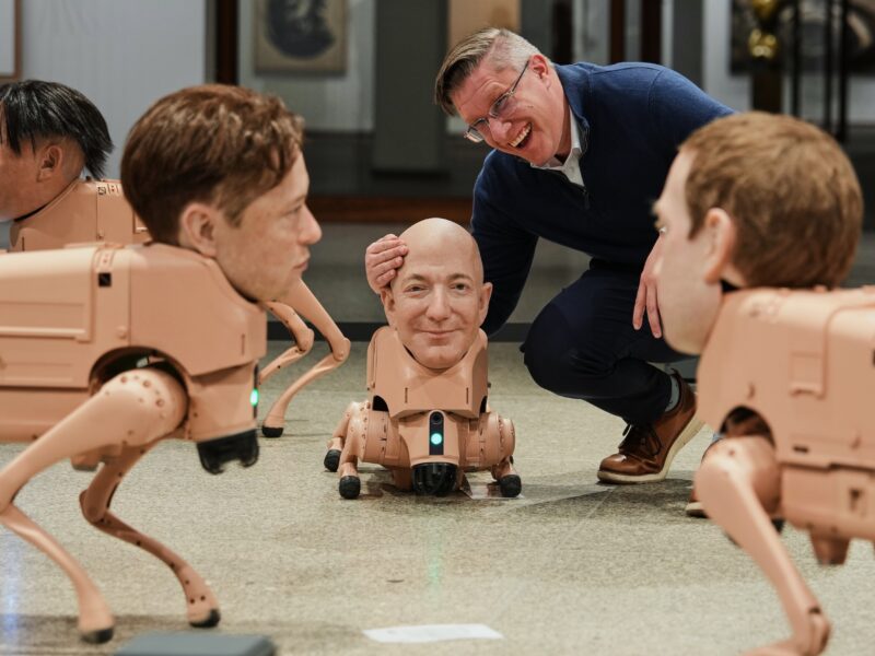 Robot dogs with Musk and Zuckerberg heads roam around Berlin museum in Beeple's new exhibit
