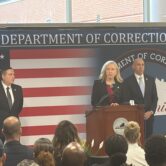 Woman speaks at podium
